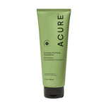 Green tube of Acure Curiously Clarifying Conditioner on a beige background