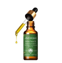 Antipodes Divine Face Oil bottle with dropper on a white background