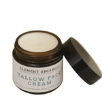 Jar of Element Organics Tallow Face Cream on a textured surface with a neutral background