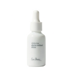 White bottle of white tea phyto-retinol elixir on a white background