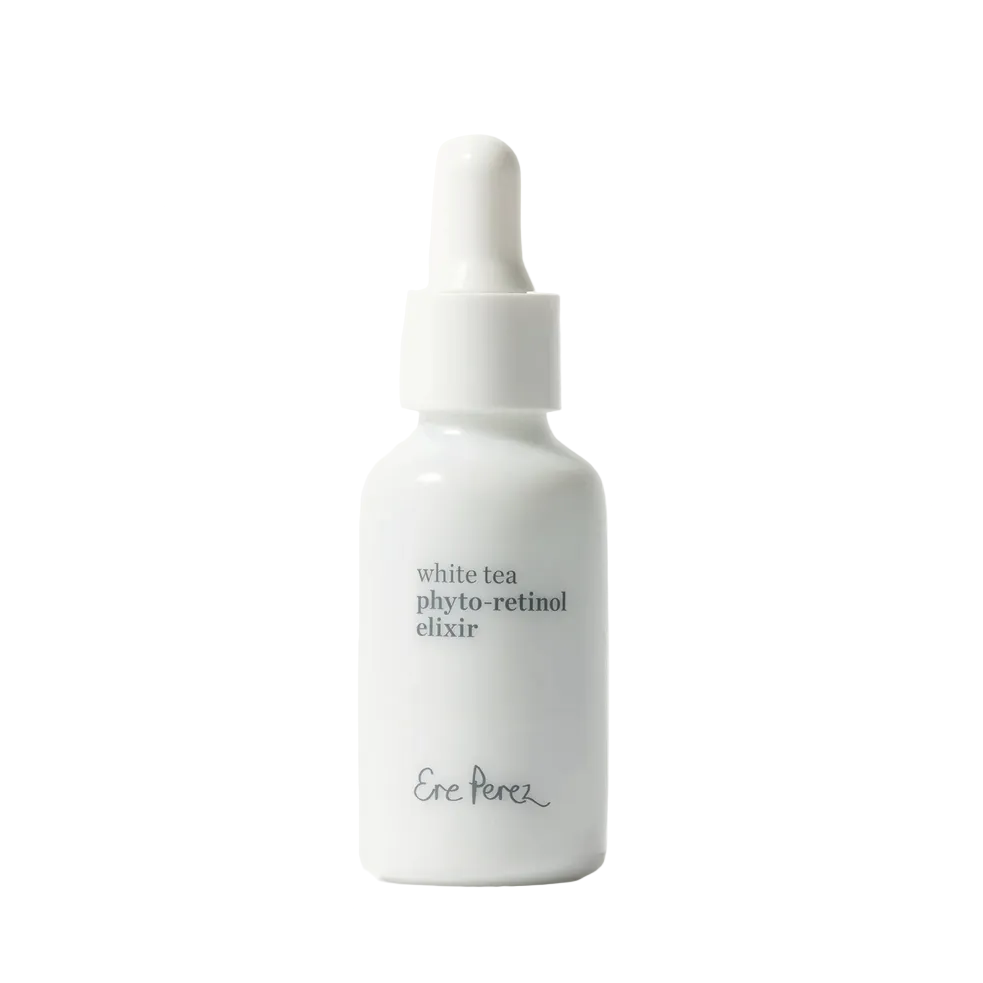 White bottle of white tea phyto-retinol elixir on a white background