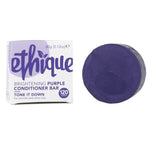 Ethique brightening purple conditioner bar packaging and bar on a white background