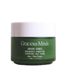 Green jar of Gracious Minds Green Genes face cream on a white background